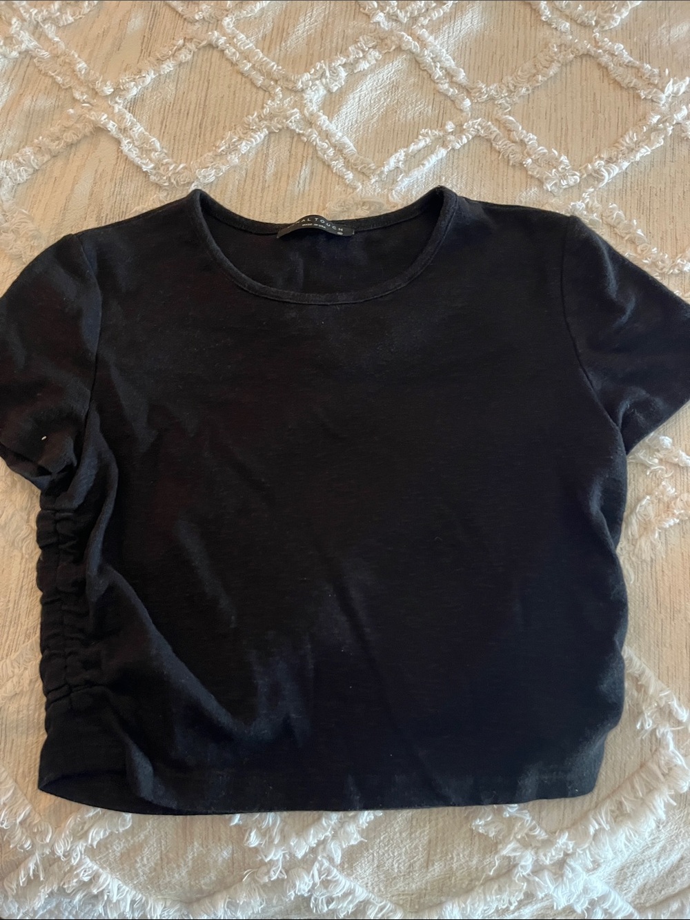 Soft black top with ruched sides. Junior size.